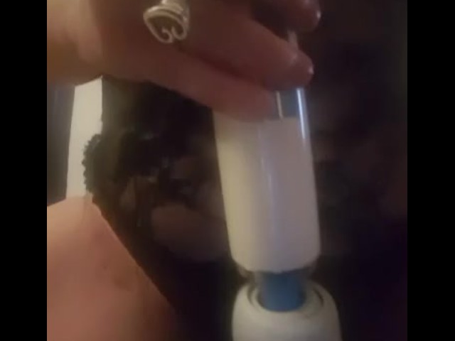 Rubbing my clit with a long dildo